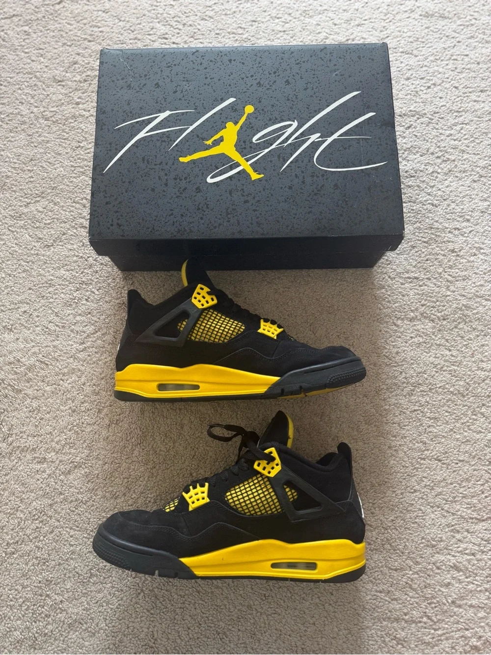 Jordan Black and Yellow Retro 4 Sneakers